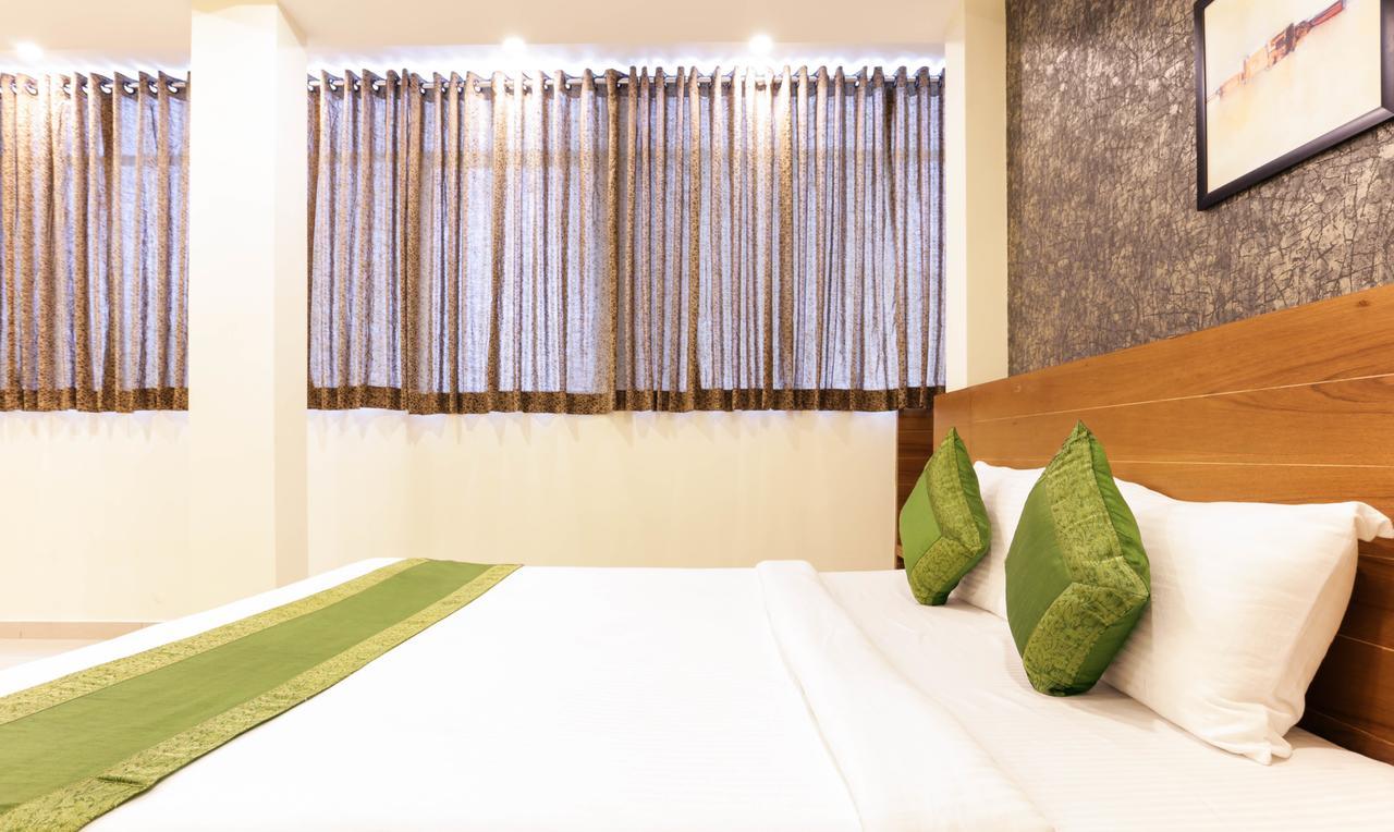 Treebo Trend Cmks Gulmohar Suites Kochi Esterno foto