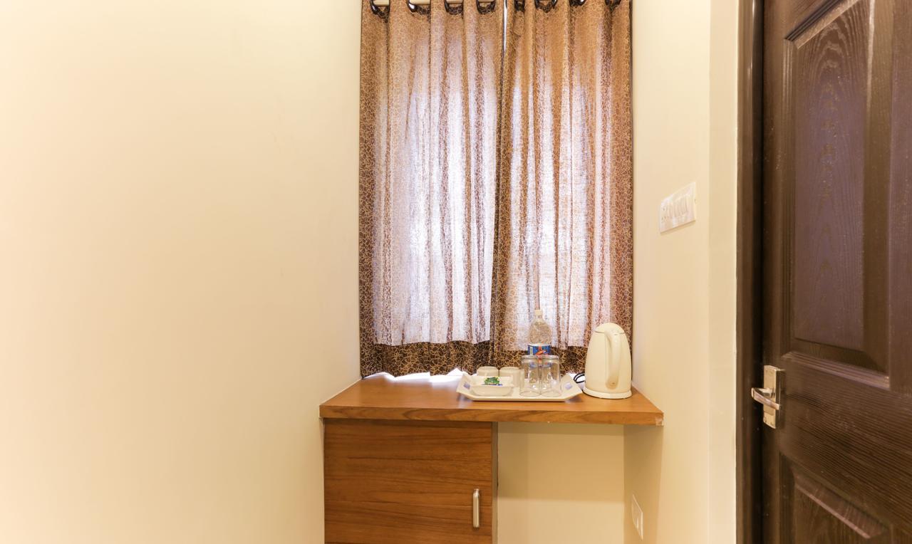 Treebo Trend Cmks Gulmohar Suites Kochi Esterno foto